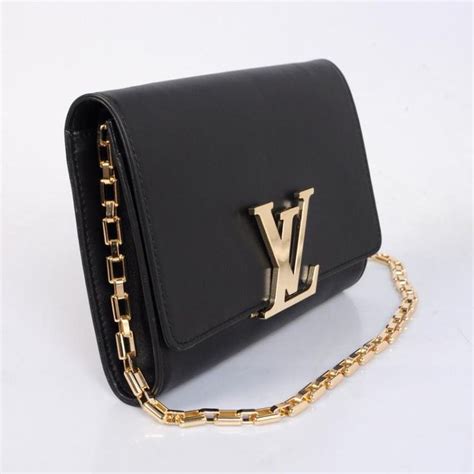 louis vuitton lockme clutch|Louis Vuitton retired evening clutch.